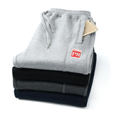 New Men Casual Clothing Plus Size 4XL Winter Fashion Loose Pants Cotton Thick Warm Loose Trousers Man Autumn Elastic Sweatpants