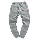 New Men Casual Clothing Plus Size 4XL Winter Fashion Loose Pants Cotton Thick Warm Loose Trousers Man Autumn Elastic Sweatpants