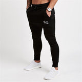 YEMEKE2017 the muscle male autumn and winter new fashion trend line casual sweatpants exercise gyms men fitness long pants